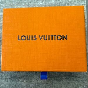 Louis Vuitton earrings, never worn, I don’t wear earrings. Retail value 750.00